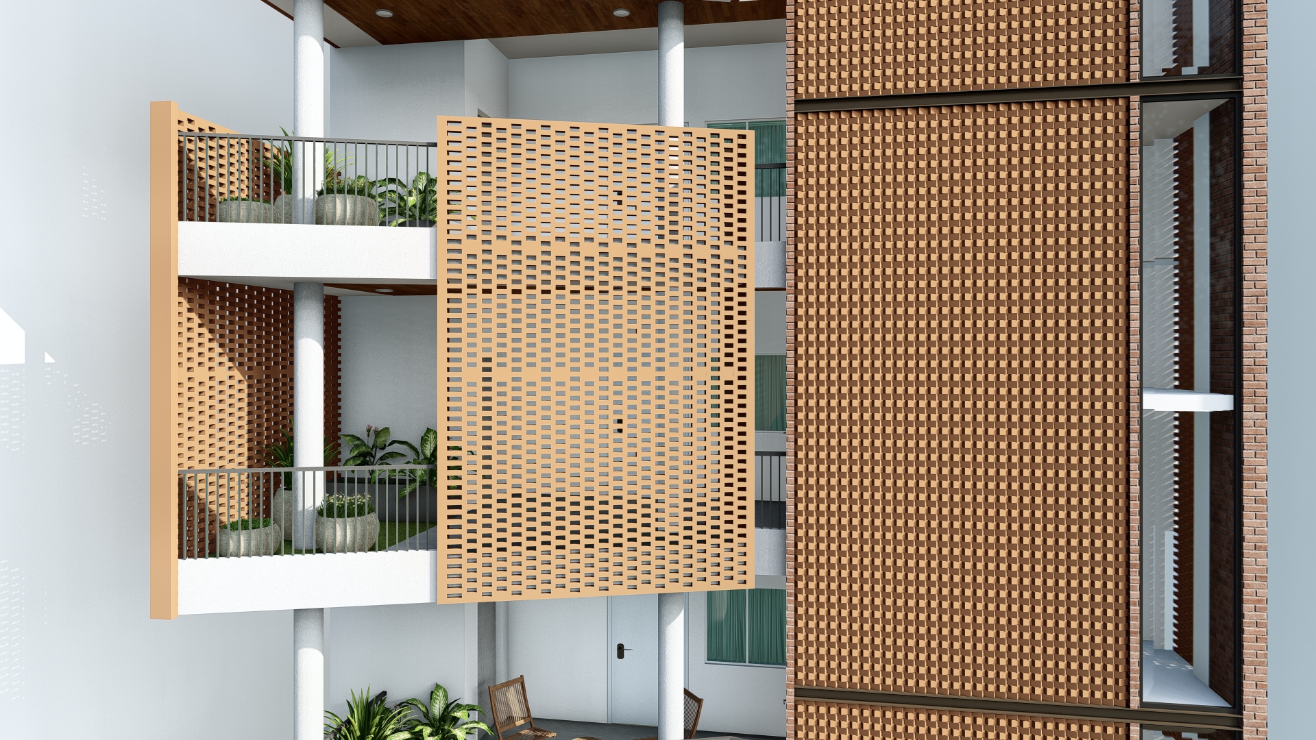 Perforated terracotta jali screens on the balconies