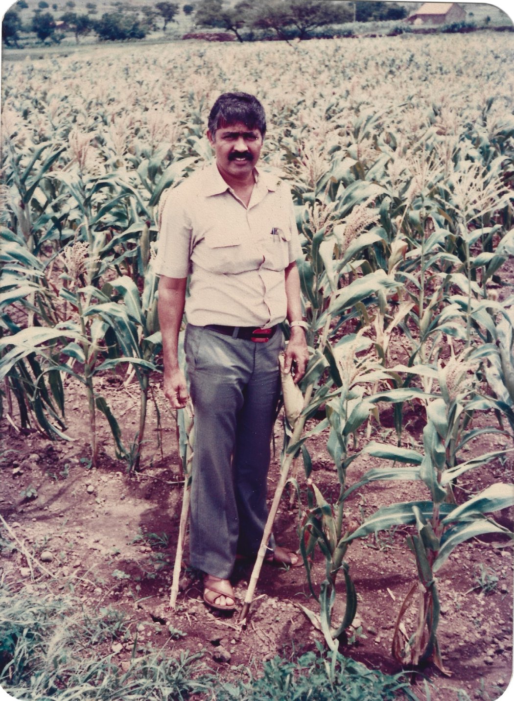 The founder standing in his fields