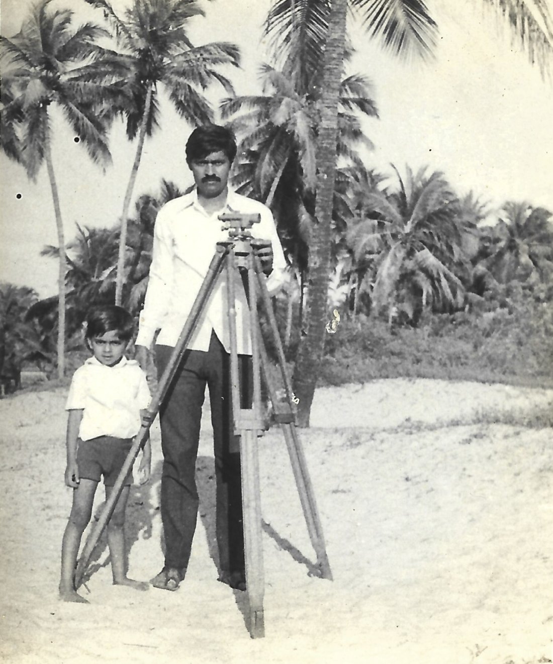Surveying a coastal plot with a dumpy level, the next generation alongside